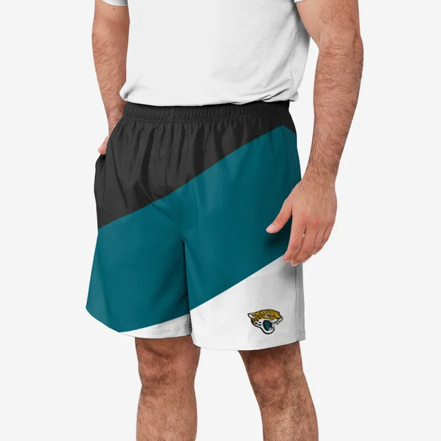 Jacksonville Jaguars Short d'entraînement à double doublure en duvet color block