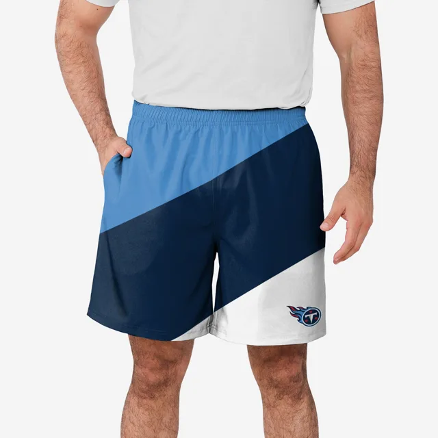 Tennessee Titans Short d'entraînement à double doublure en duvet color block