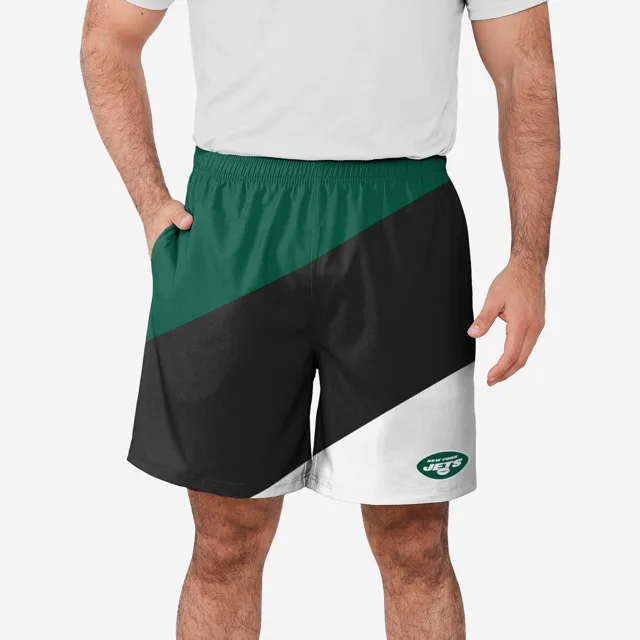 New York Jets Short d'entraînement à double doublure en duvet color block