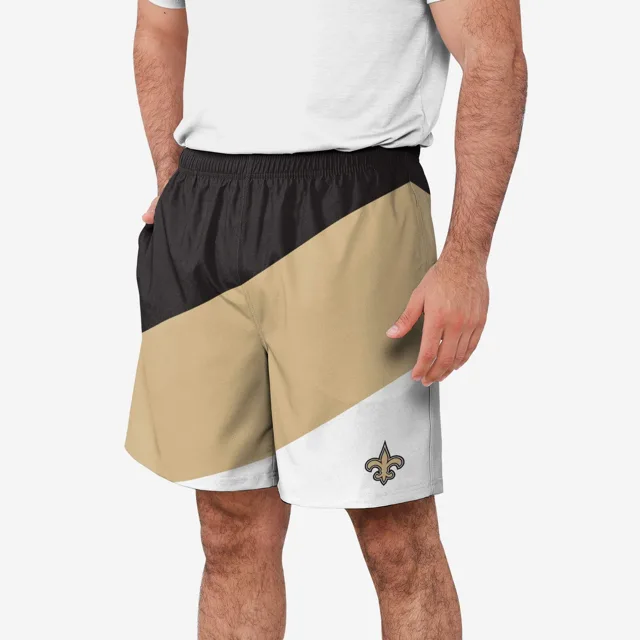 New Orleans Saints Short d'entraînement à double doublure en duvet color block
