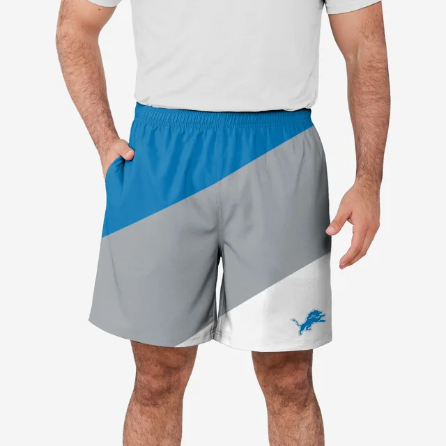 Detroit Lions Short d'entraînement à double doublure en duvet color block